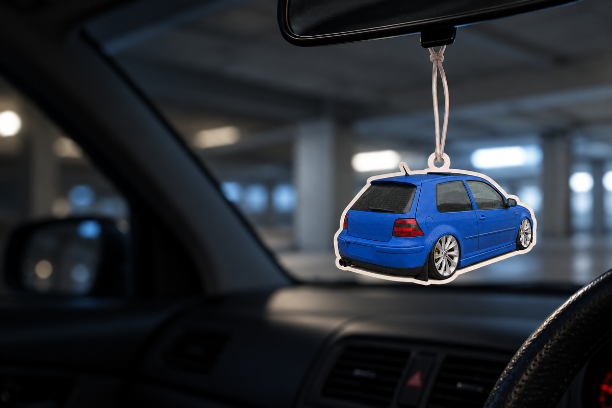 Luna campaign mockup of a blue Golf photo air freshener hanging inside a car